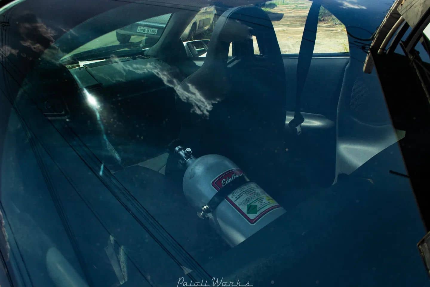 NOS nitrous injection kit mounted in the back seat of the 4th gen Camaro