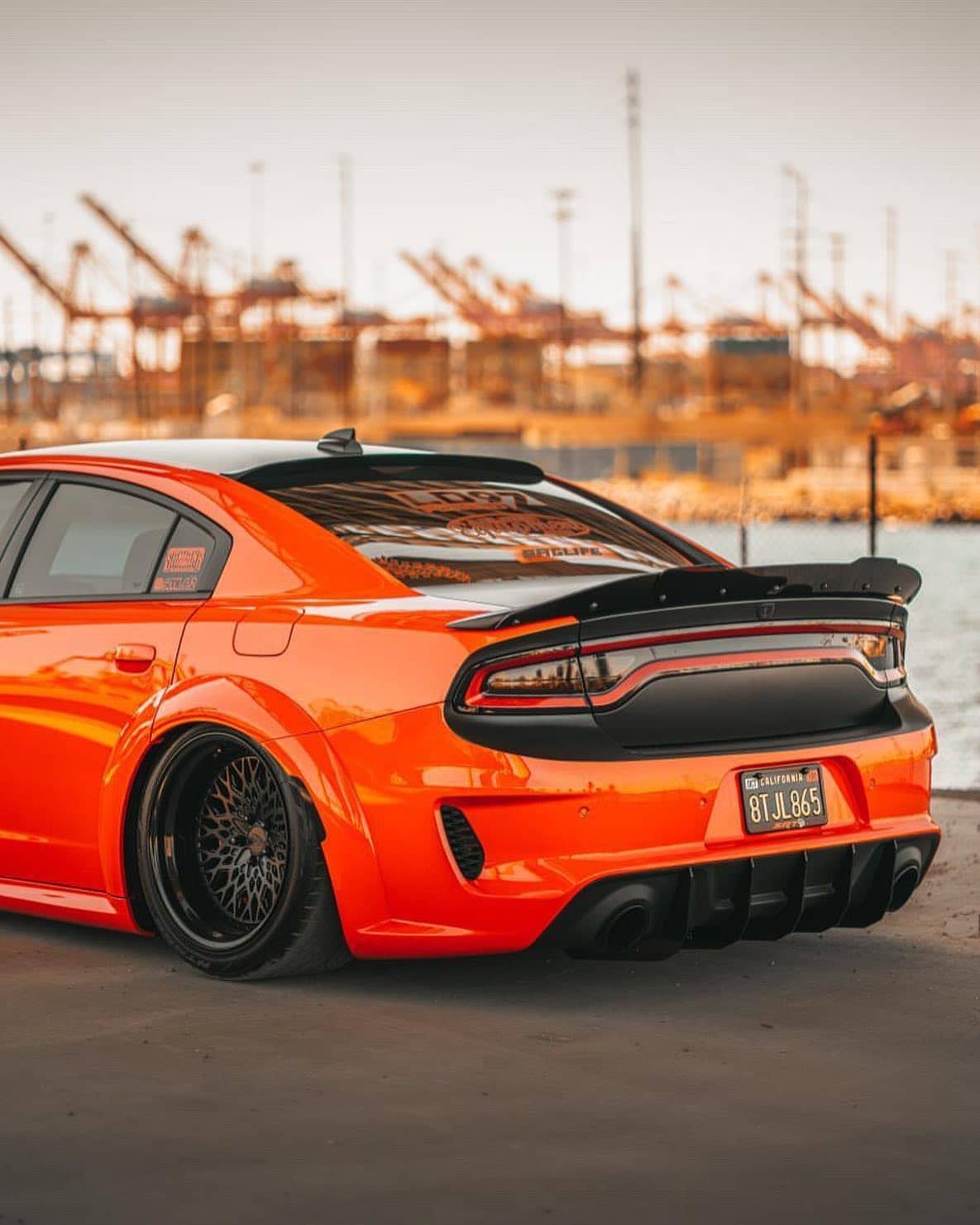 Dodge Charger hellcat with custom blacked out trunk and rear bumper. Rear window spiler