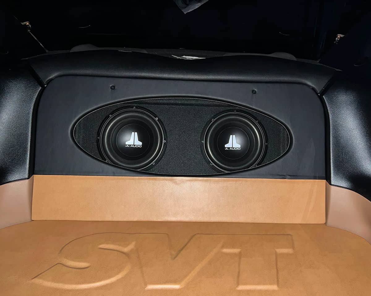 Custom SVT rear seat delete and Custom made speaker box with 2 10” JL audio v3 subwoofers powered by a Rockford Fosgate amp P500x2
