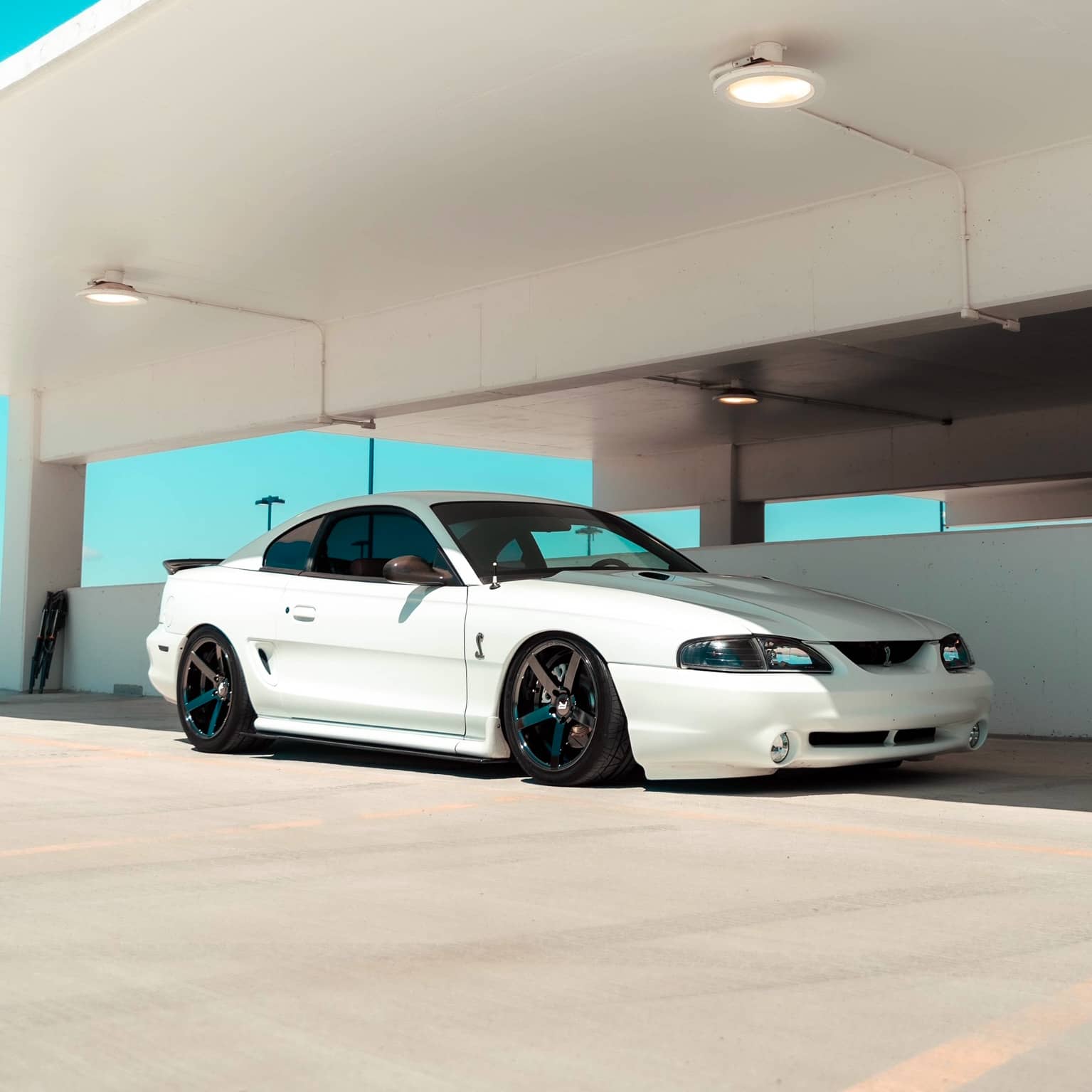 Slammed 1997 Ford Mustang Cobra SVT on airlift suspension