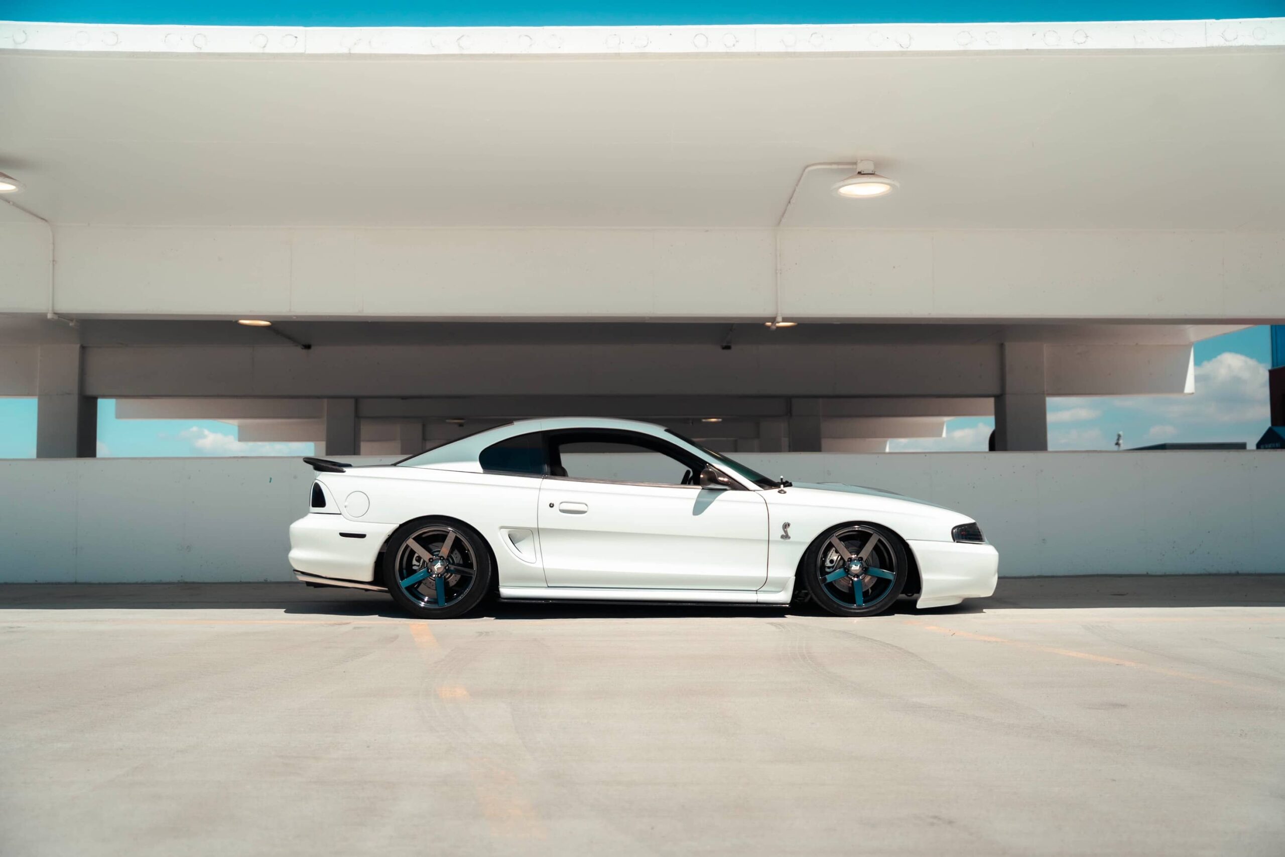 Bagged SN95 Ford Mustang Cobra with Custom Mods
